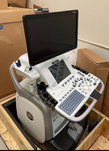 GE LOGIQ E9 ultrasound on a cart