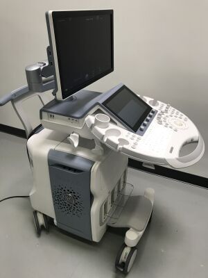 GE VOLUSON E8 BT19 ultrasound machine on a cart